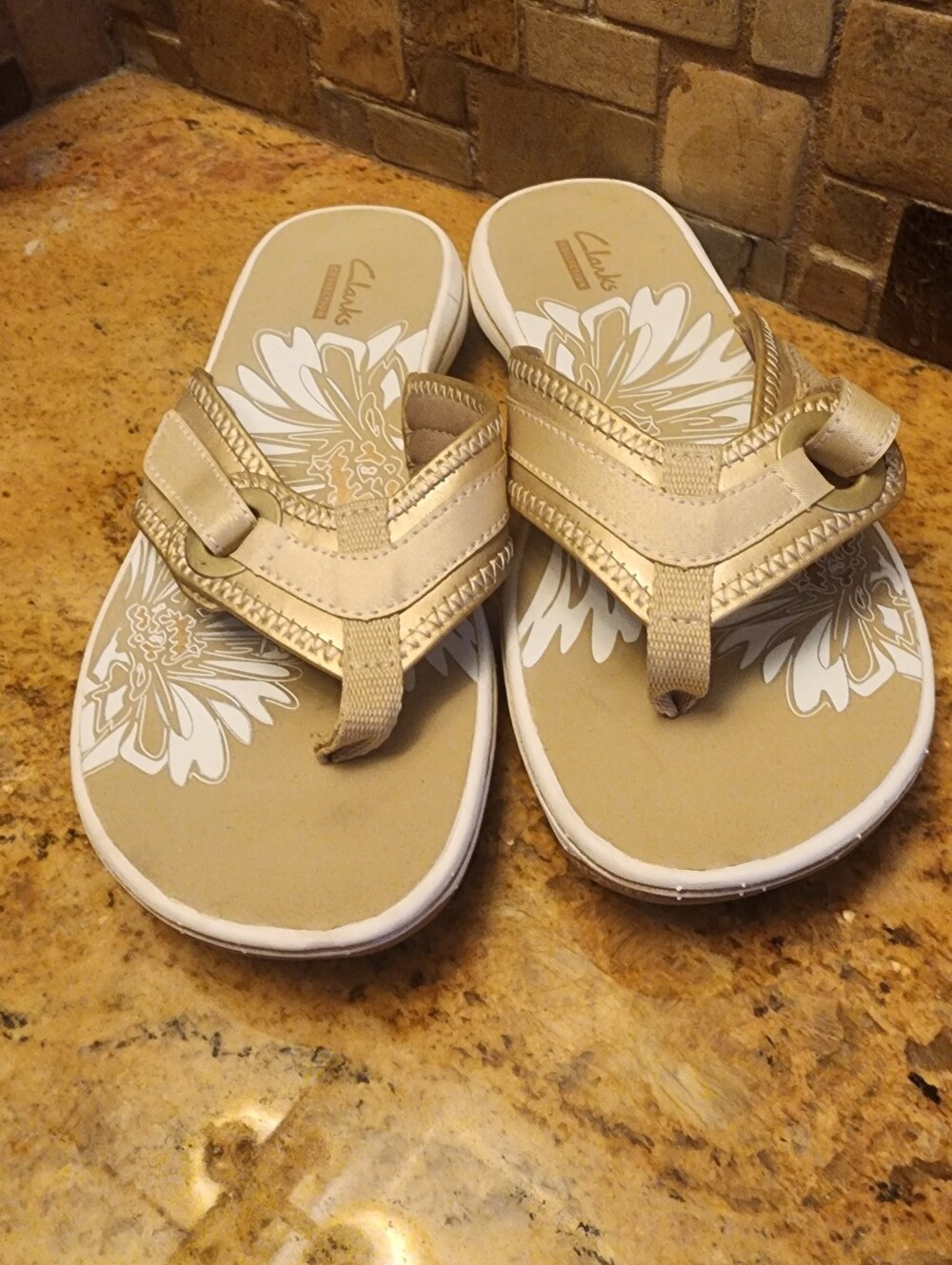 Clarks Women’s Gold Floral Comfort Flip Flops